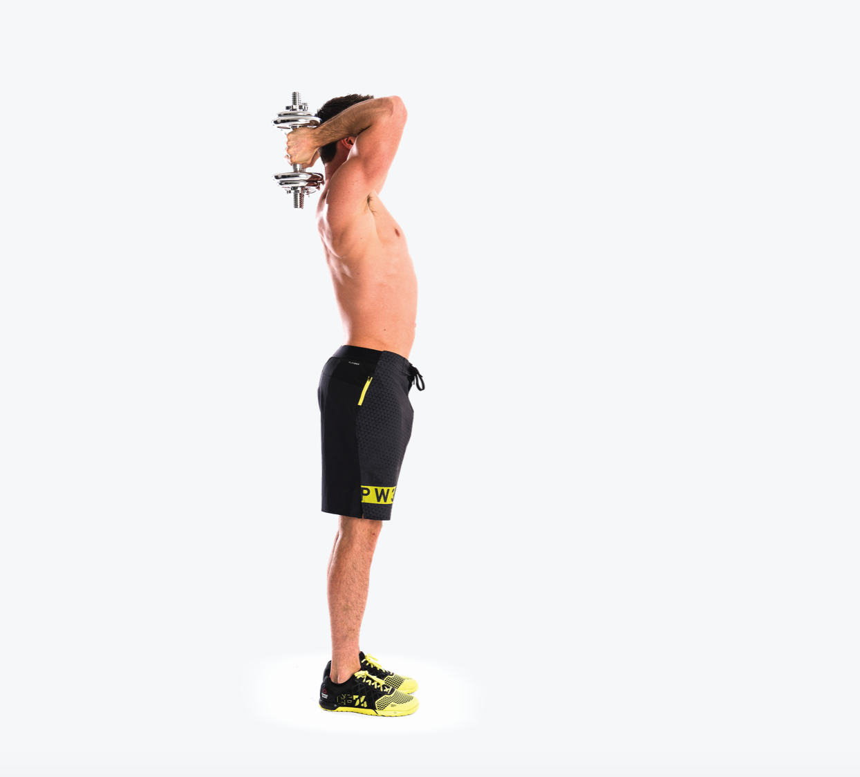 man demonstrates triceps extension in dumbbell shoulder and arm workout; standing tall, he holds a dumbbell behind his head with both hands before raising it up and lowering it