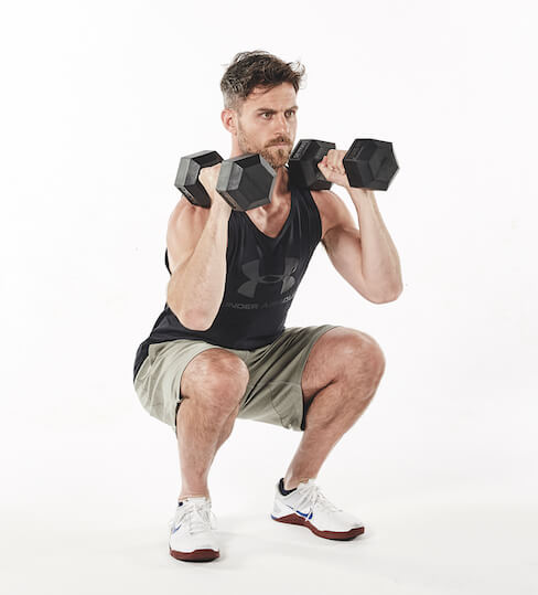 man demonstrates dumbbell thruster in 30-minute fat loss workout