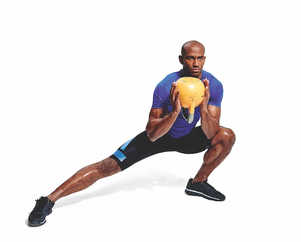 man performing kettlebell side lunge in workout for cyclists