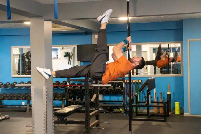 Why All Men Should Try A Pole Strength Class | Men's Fitness