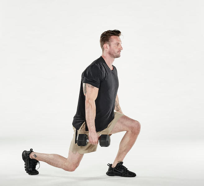 man performs dumbbell split squat
