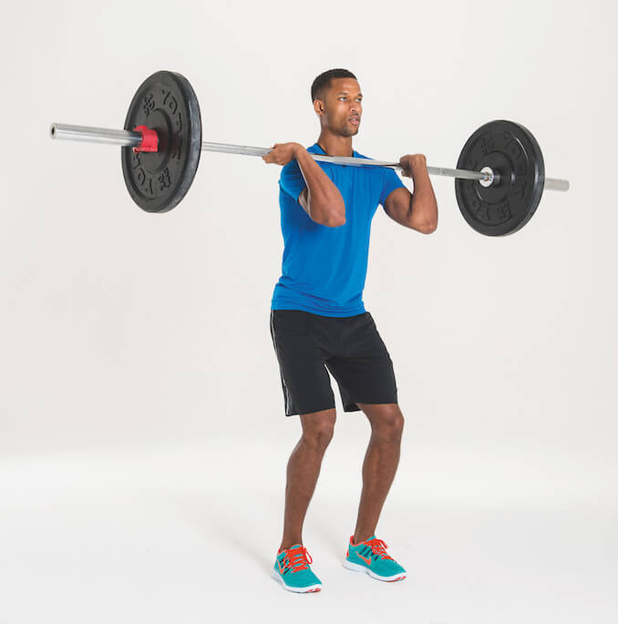 man performing first stage of barbell jerk