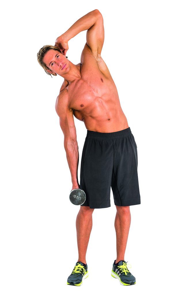 Man performing dumbbell side bend in dumbbell abs workout