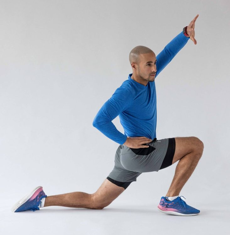 Man performing end of a lunge flexor 