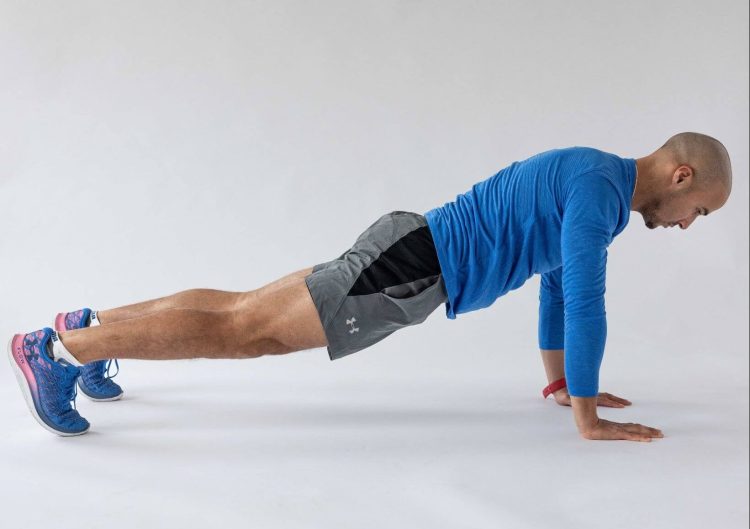 Man in a press-up position 