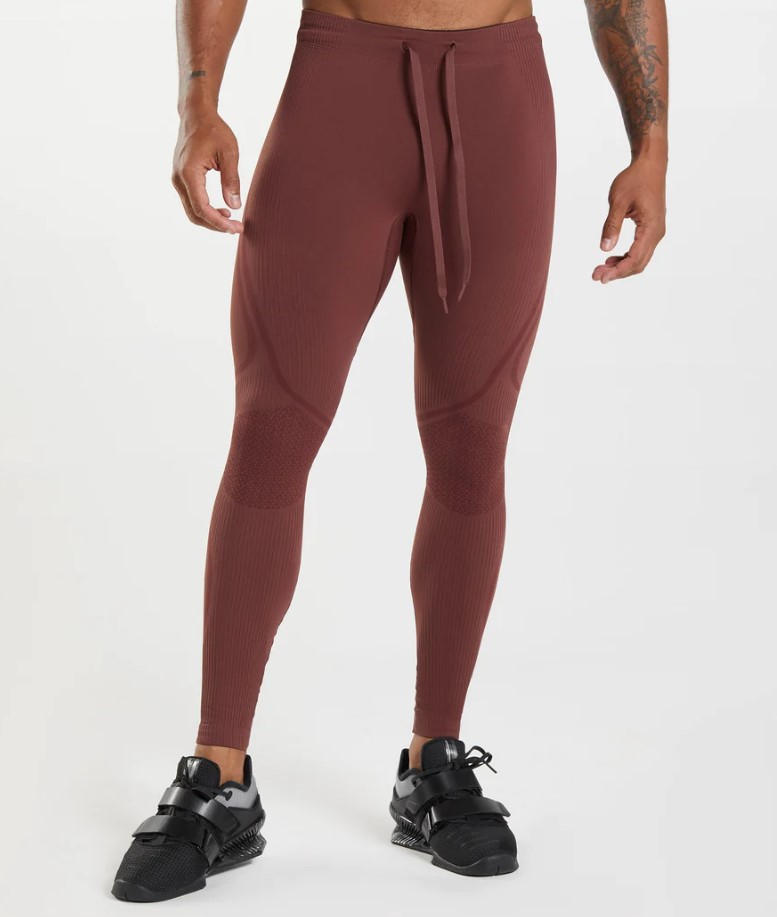 Lower torso of a man wearing Gymshark 315 compression tights