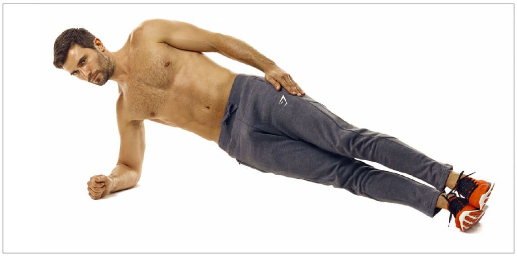man performing side plank abs exercise
