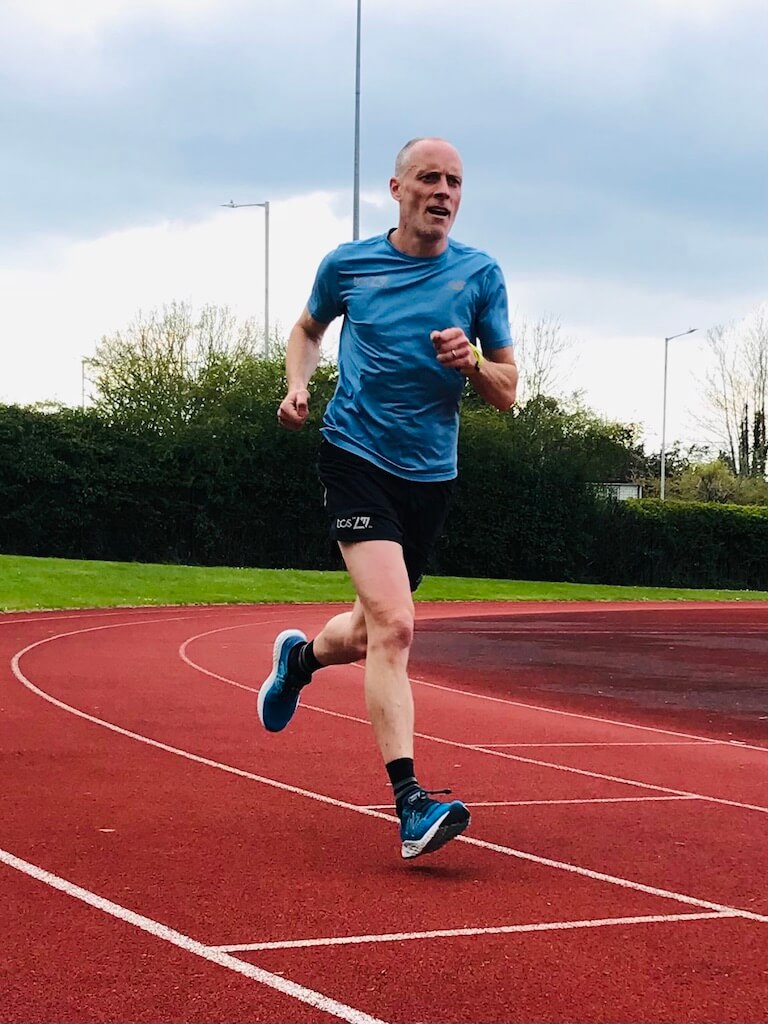 Kelsey Publishing CEO Steve Wright runs around a track as he trains for the London Marathon 2023