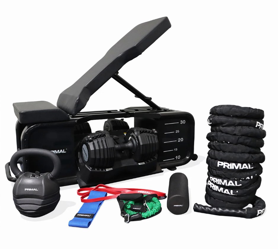 Product shot of a Primal HIIT workout bench and weight accessories, home gym equipment review