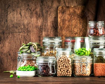 Dried and fresh legumes and grains in jars
