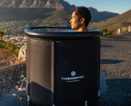 A man immersed in an ice bath