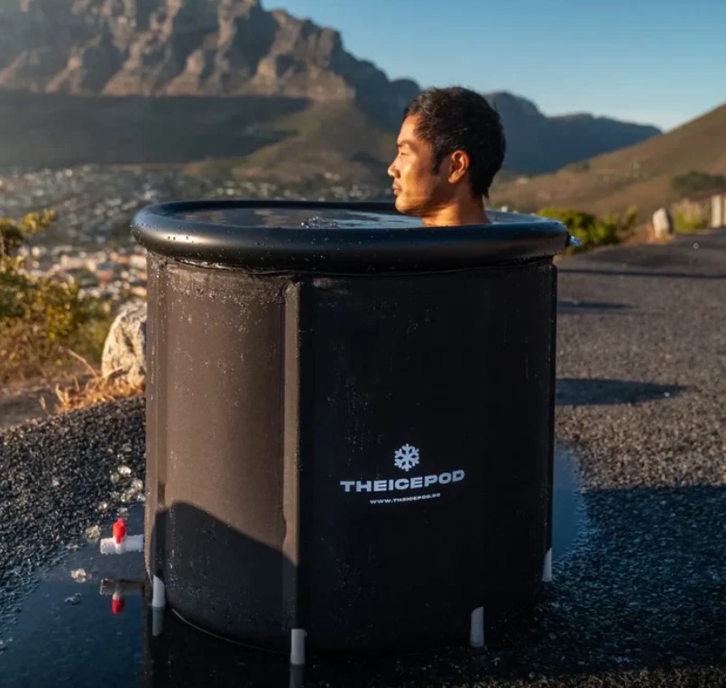 A man immersed in an ice bath