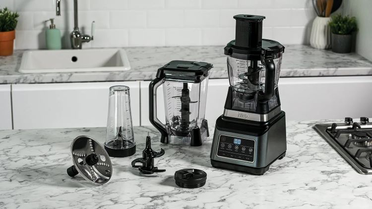 Ninja blender and accessories on a kitchen tabletop