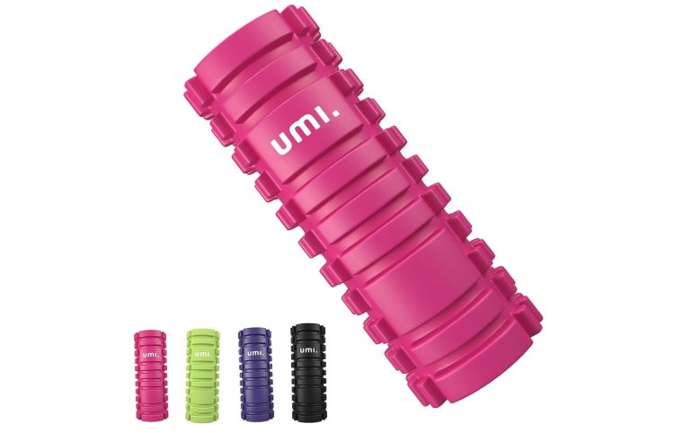 Product shot of a pink Umi foam roller