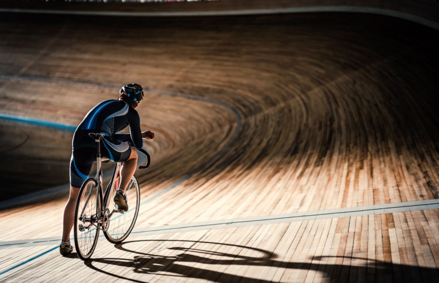 man track cycling in velodrome