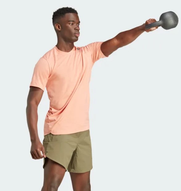 A man swinging a dumbbell