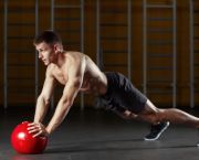 Man exercising in gym shorts