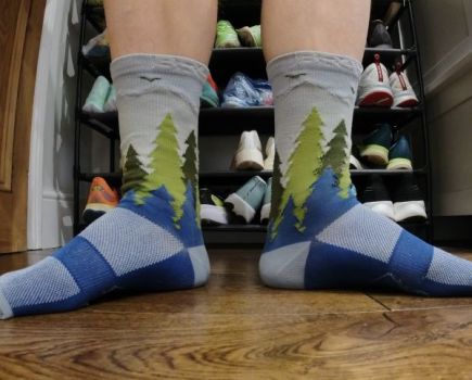 Close-up of a man's feet in running socks