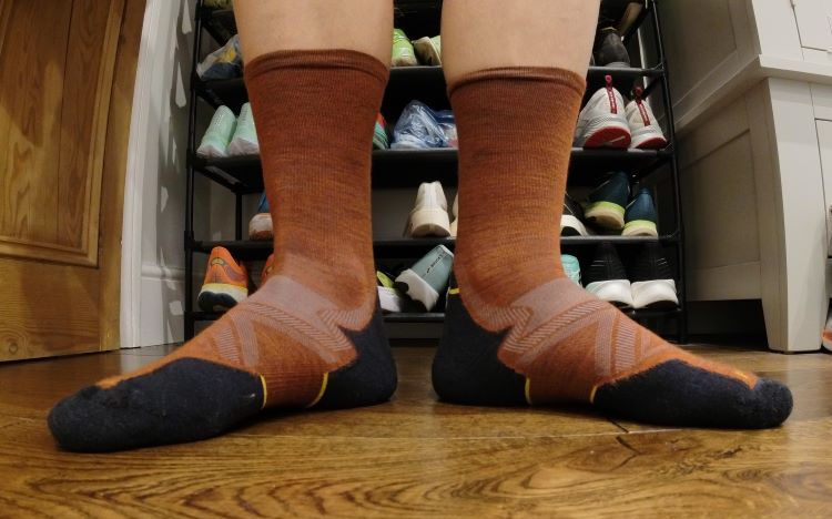Close-up of man's feet wearing Smartwool running socks