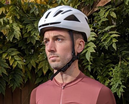 Man wearing a Specialized cycling helmet