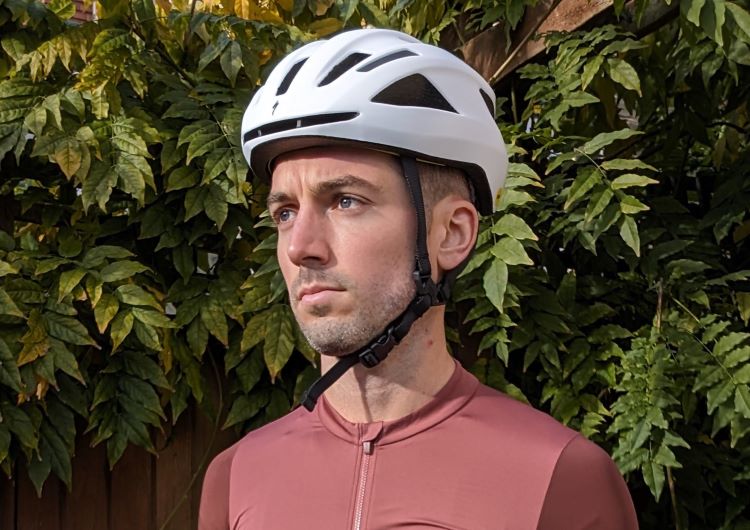 Man wearing a Specialized cycling helmet