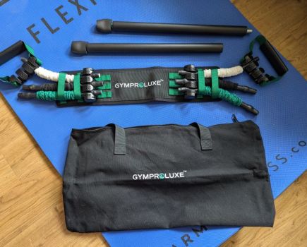 Glyproluxe band and bar set on an exercise mat