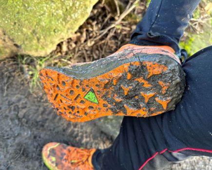 Asics Fujispeed 2 trail shoes covered in mud