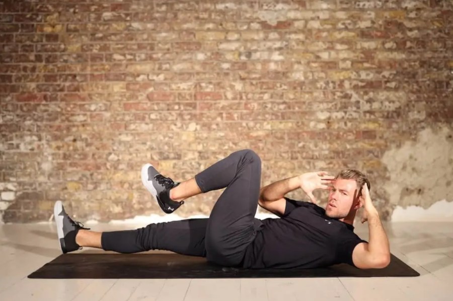 Man performing a bodyweight abs workout