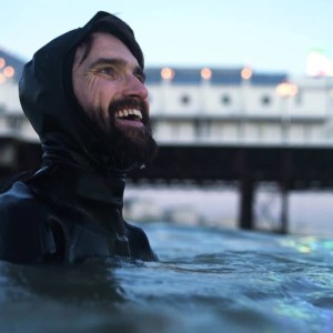 Men's Fitness contributor Joe Minihane swimming in the sea in Brighton