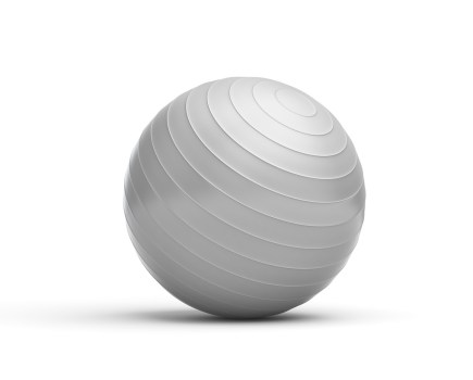 grey exercise ball against white background
