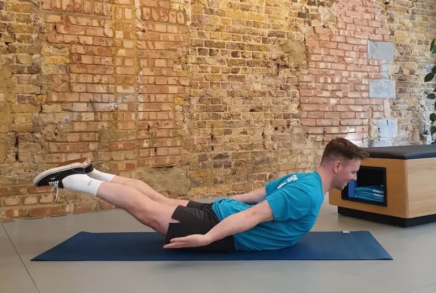 Man performing a mid-back extension stretch