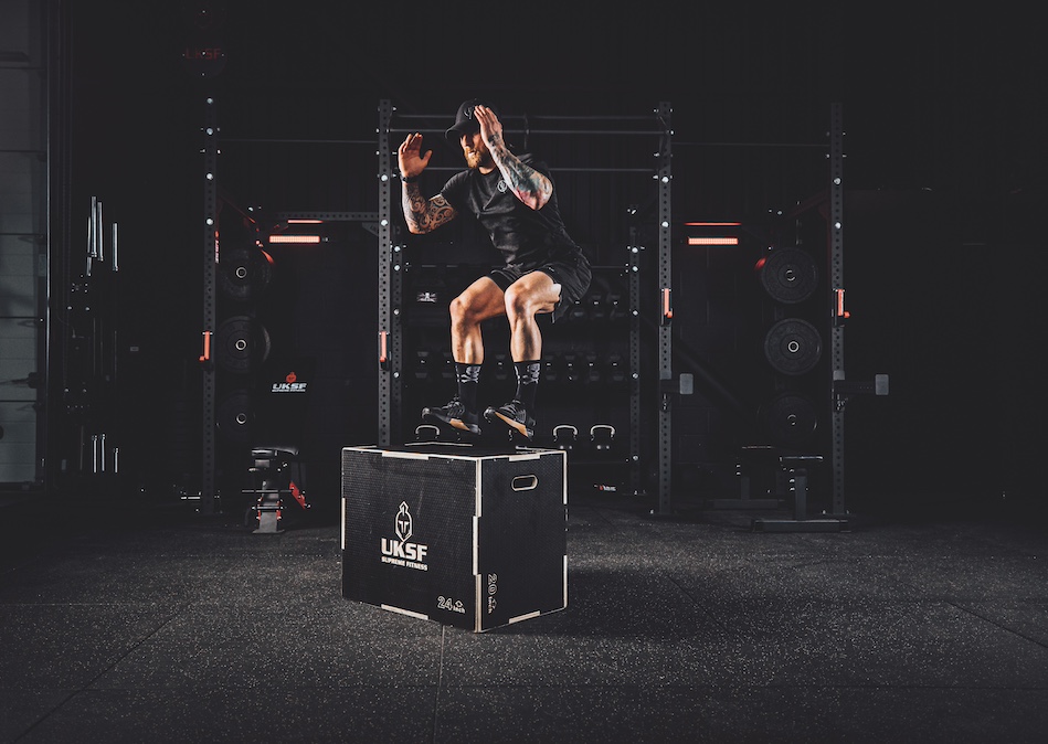 Anthony Stazicker demonstrating how to do a box jump as part of a functional strength workout