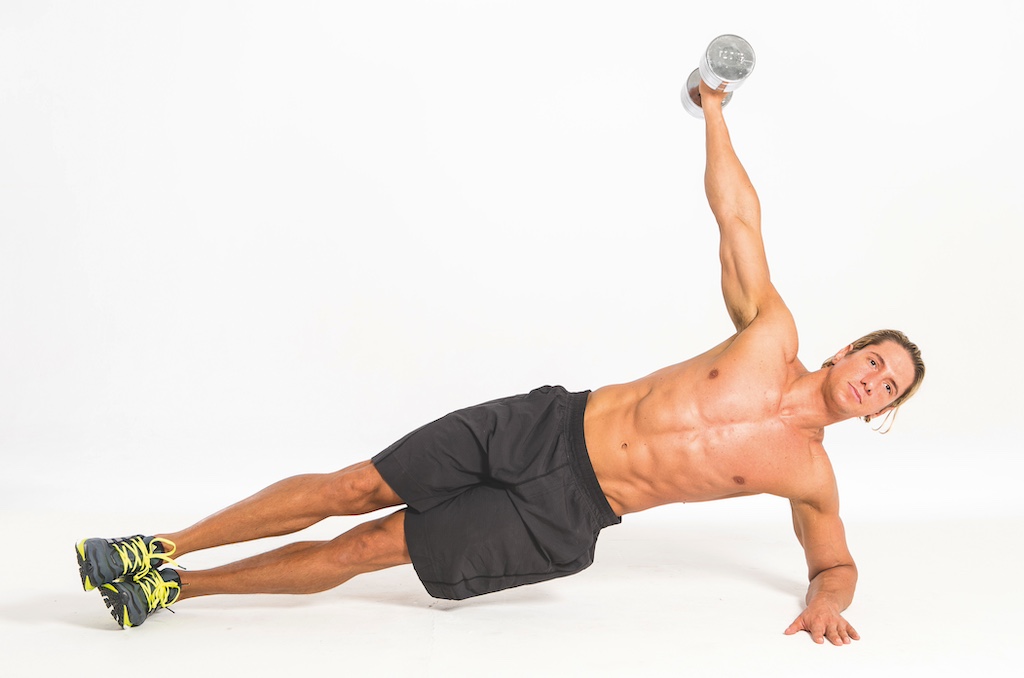 topless fitness model performing dumbbell side plank with lateral raise