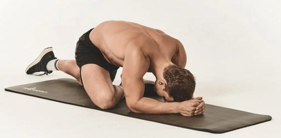 Man performing stretches for weight lifting