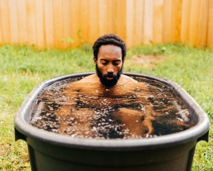 man in ice bath in garden