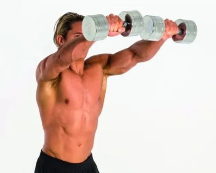 Close-up of a man performing a dumbbell front raise