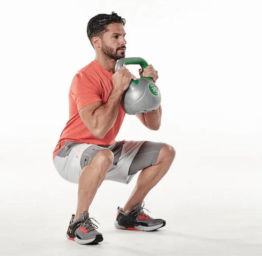 Man performing a kettlebell goblet squat