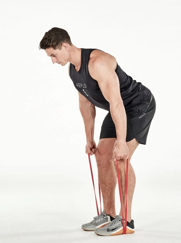 Man performing a resistance band bent-over row