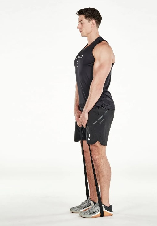 Man performing a resistance band deadlift