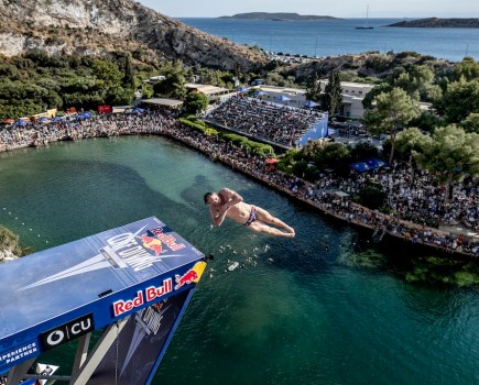 Aidan Heslop of the UK dives from the 27 metre platform during the final competition day of the first stop of the 2024 Red Bull Cliff Diving World Series at Lake Vouliagmeni in Athens, Greece on May 26, 2024