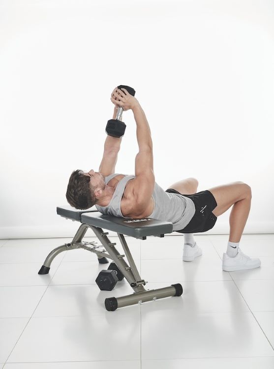 Man performing a dumbbell pullover