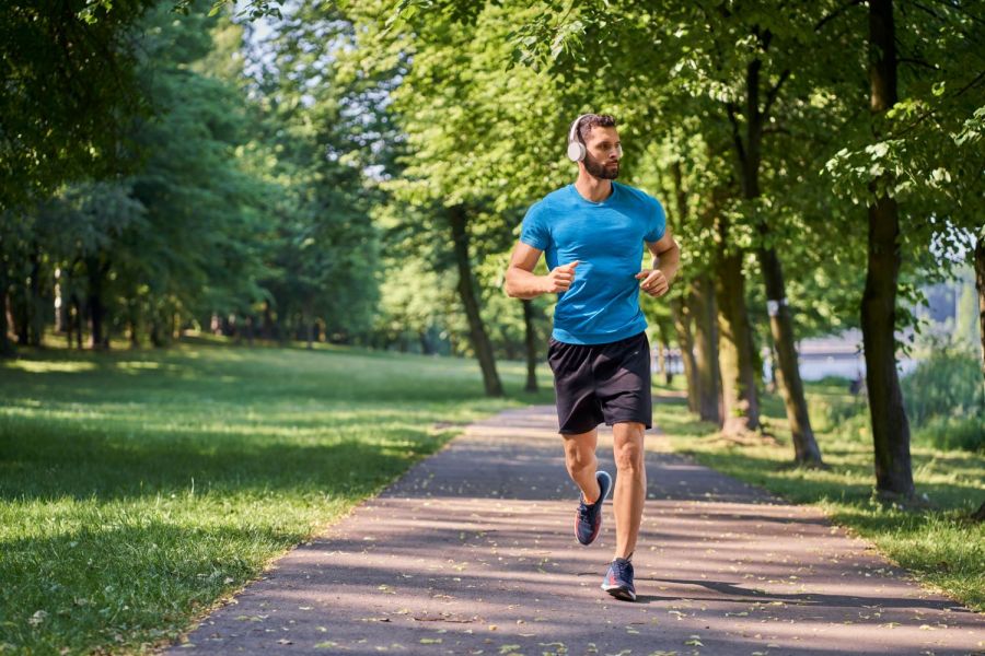 A man running in a forest