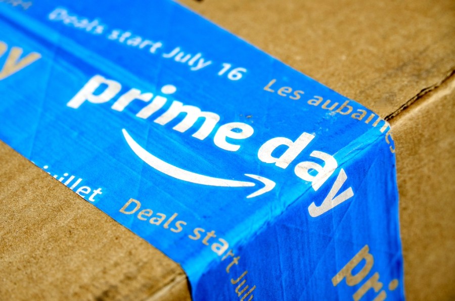 Amazon Prime Day cardboard box with Prime Day logo and tape on it. Amazon Prime Day is the retailer's big members-only summer sale in month of July each year