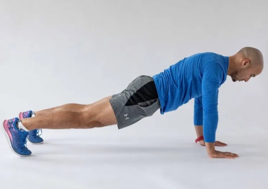 Man performing a world's greatest stretch  