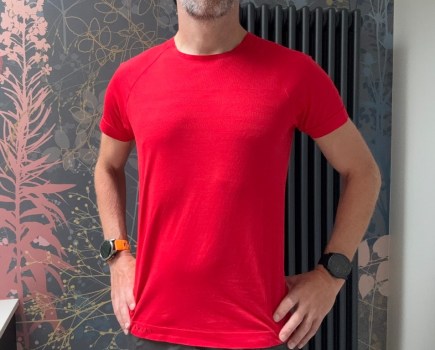 Man wearing a red running top