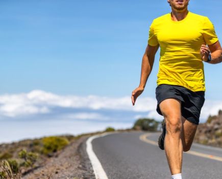 Close-up of a man in running shorts