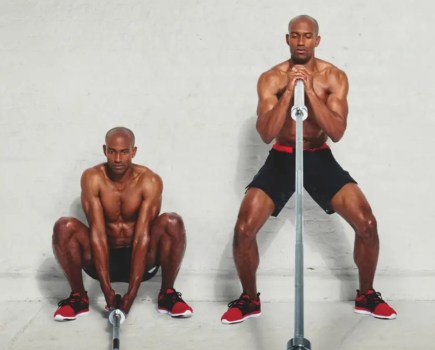 Man performing a barbell exercise