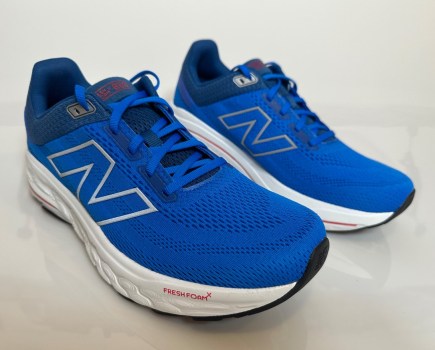 A pair of blue New Balance running shoes